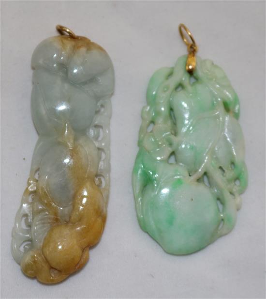 A group of five jadeite pendants and other hardstone carvings, 20th century, 2.4 to 7.7.cm (10)